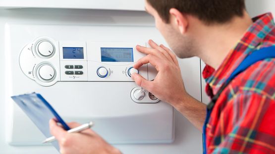 A boiler being checked after installation 